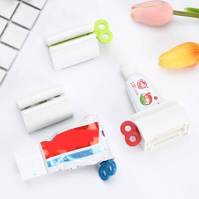 1Pc New Hands Rolling Tube Squeezer Toothpaste Dispenser Squ