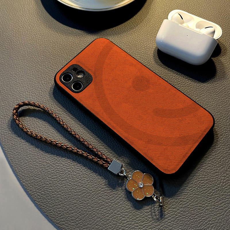 适用苹果iPhone17手机壳14plus/16Pro/Max/15/13女12硅胶Air创意皮纹全包防摔保护套挂绳潮新款简约橙色笑脸