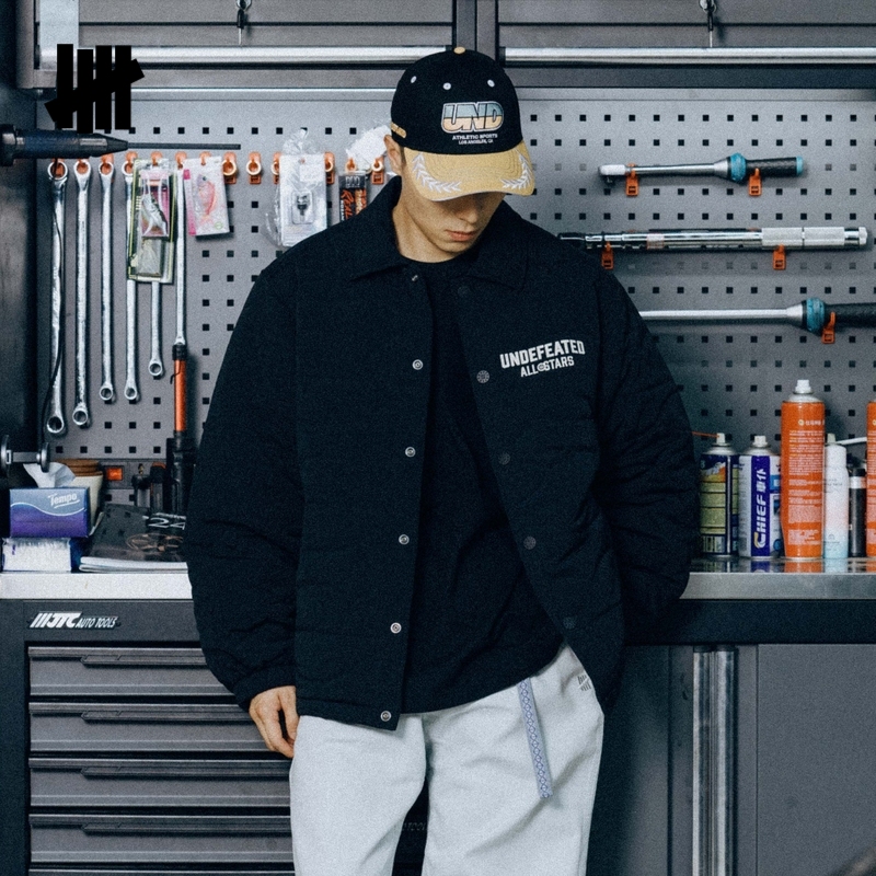 UNDEFEATED美式绗棉翻领教练棉服