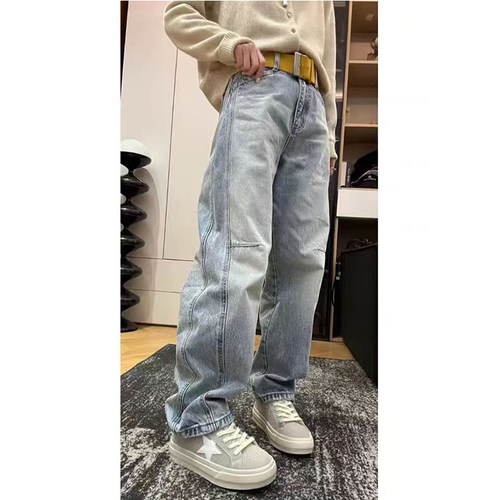 复古磨白拼接弯刀牛仔裤