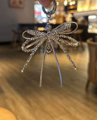 原创甜美芭蕾风蝴蝶结手机链银色爱心双层水晶珍珠挂件ins包挂新