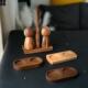 grid Wooden bottom tray two pepper grinder