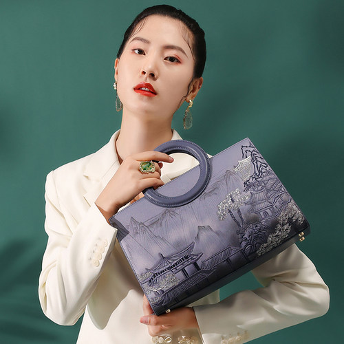 古伊西牛皮刺绣大容量妈妈包