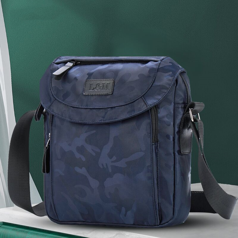 香港牛津布大容量男包新款邮差包