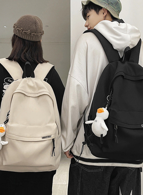 大学生书包双肩包男士简约大容量旅行背包女休闲日系初中生高中男