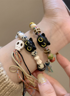 骷髅猫咪陶瓷编织绳手链女小众设计感甜酷中国风流苏彩色手串手饰