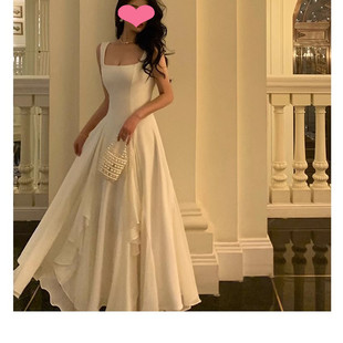 白色吊带连衣裙女2026新款 温柔气质小众设计收腰芭蕾长裙