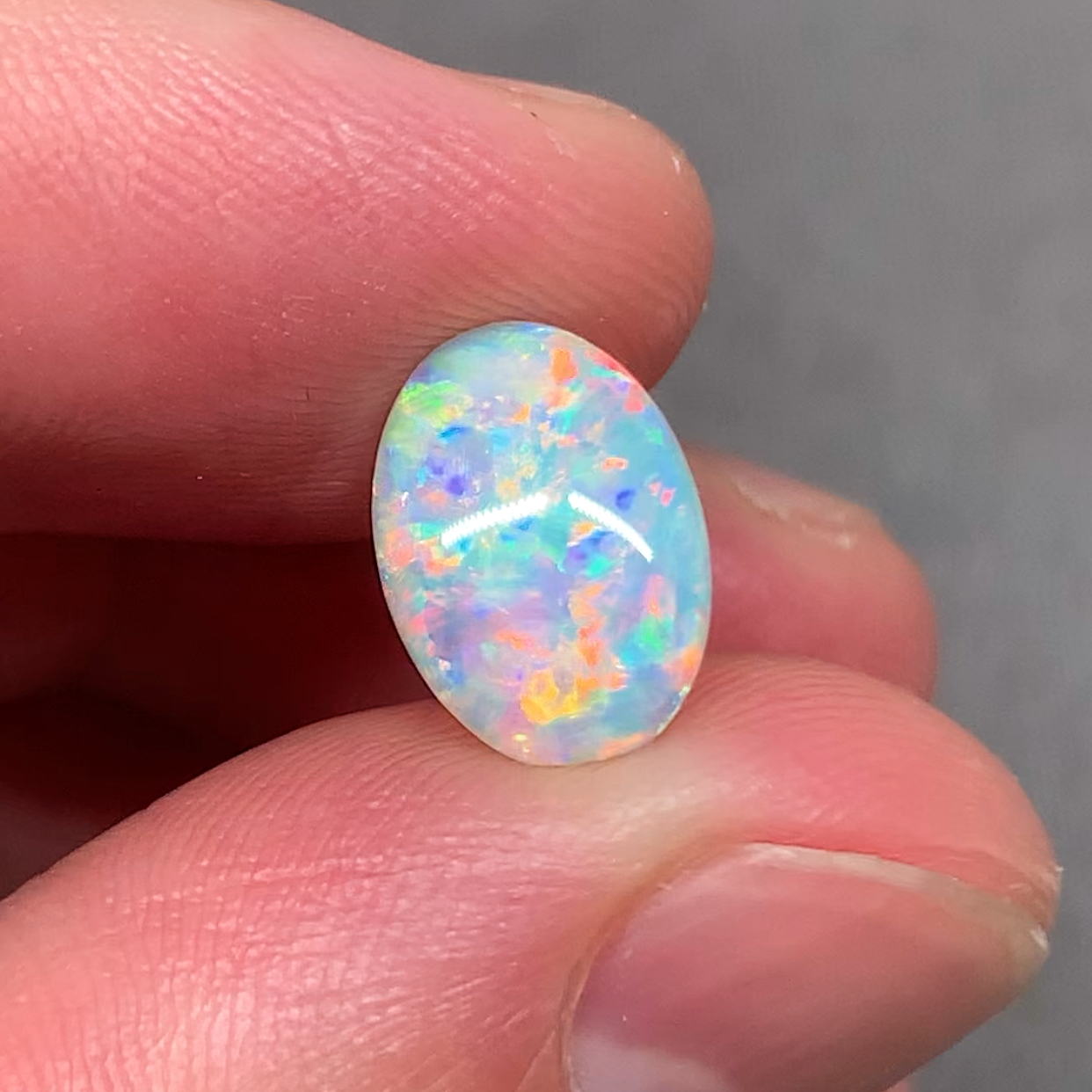 澳洲天然欧泊粉蓝橘彩白欧泊戒指吊坠定制1.62ct 11*7.8*3mm