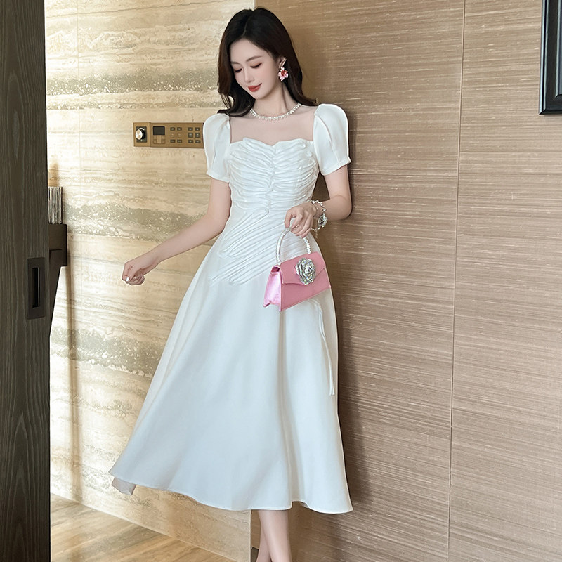 白色连衣裙女夏季新款高级感轻奢小众宴会礼服气质收腰a字长裙子
