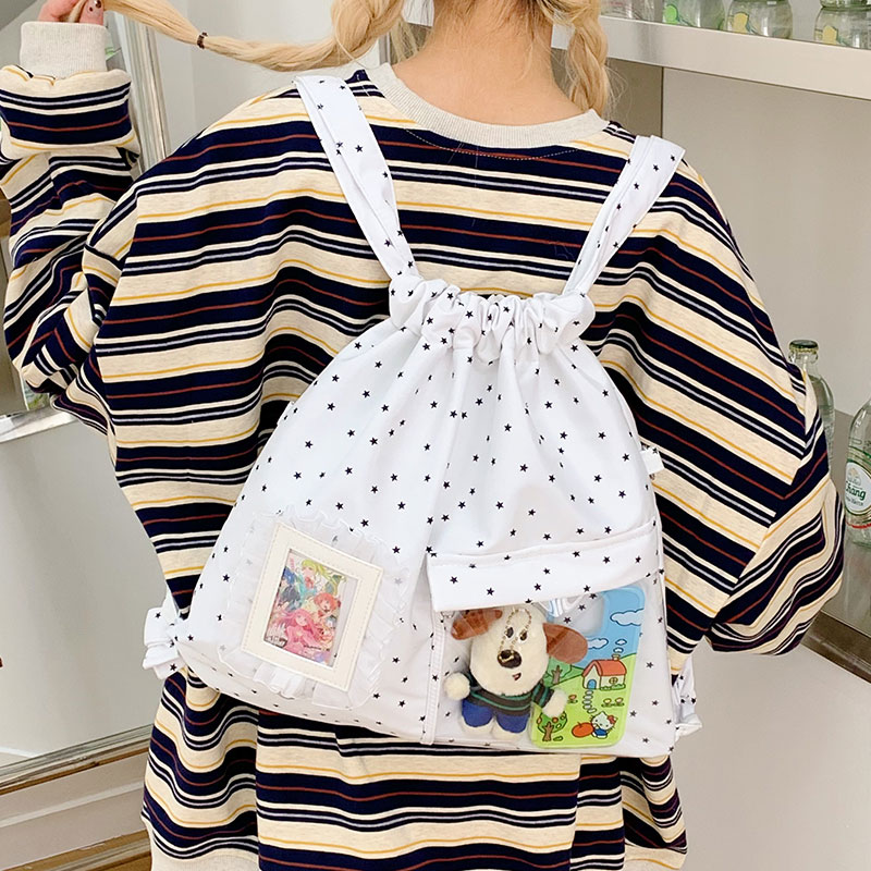 韩系可爱卡通抽绳双肩包女软妹学生痛包大容量百搭通勤束口袋背包