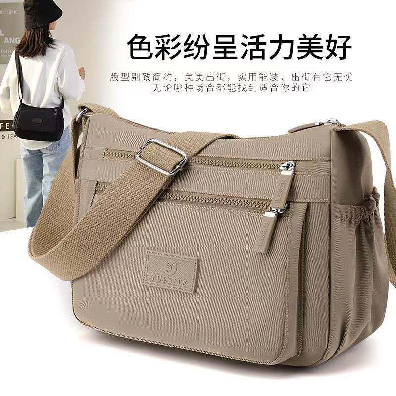 无印日本进口防水斜挎妈妈包女2026新款多层牛津布单肩大容量包包