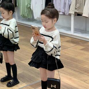 韩版童装2026春季新款黑白镂空条纹宽松毛衣女童黑色蛋糕裙两件套