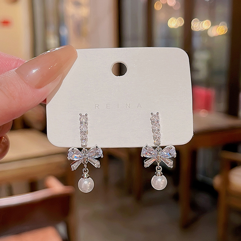 S925银针精致锆石蝴蝶结耳环女长款流苏百搭气质珍珠耳钉耳饰