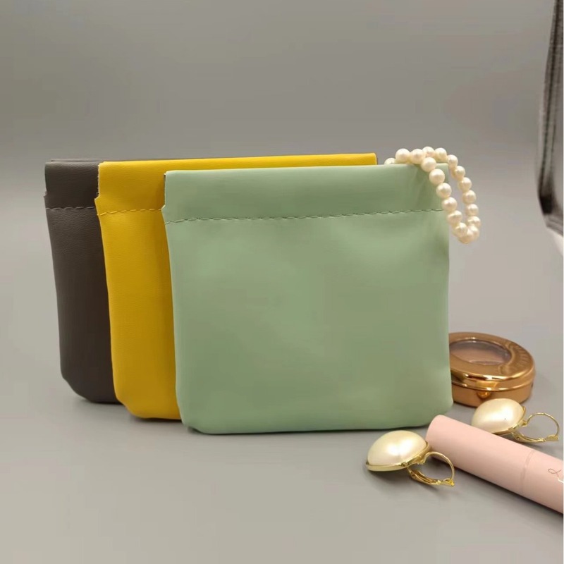 可爱弹片小化妆包自动闭合零钱包数码收纳包首饰收纳袋