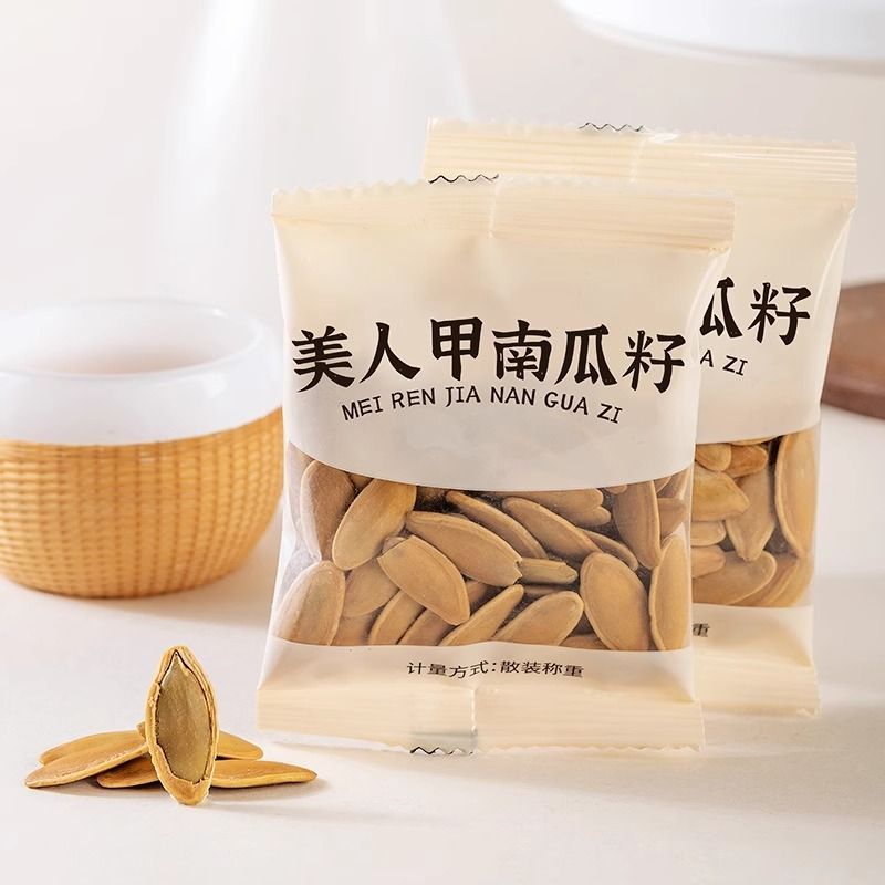 美人甲南瓜籽小包装散称新疆新货椒盐味长粒休闲零食特产大