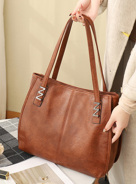 托特包包女式2026新款牛皮大容量通勤包百搭手提水桶包大包电脑包