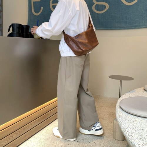 卡其色打褶垂感半松紧休闲裤男生