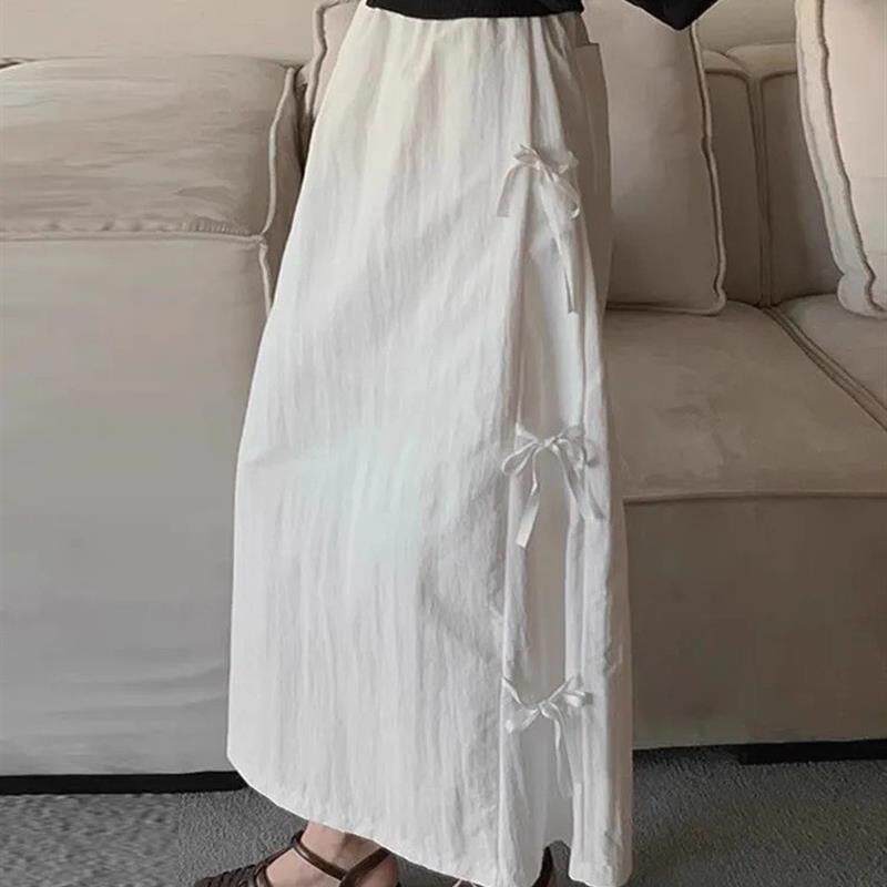 白色蝴蝶结系带半身裙女2025新款夏季a字垂坠感气质显瘦休闲长裙