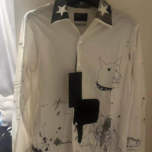 翻领长袖印花拼接满印