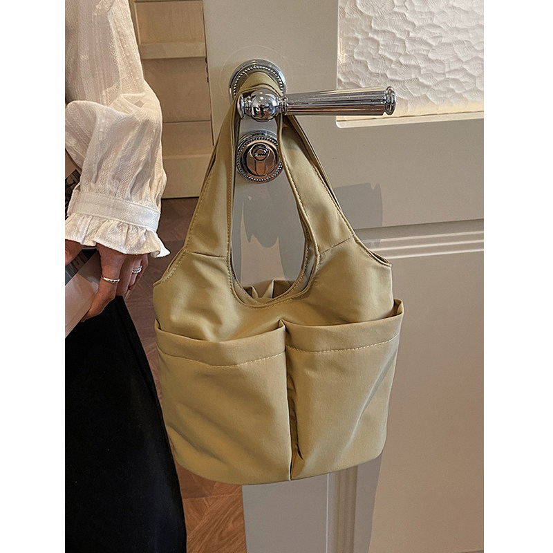 楠小姐原创简约多口袋手提包女2026新款通勤上班百搭帆布托特包女,箱包皮具/热销女包/男包,水桶包,淘宝优惠券,粉丝福利购,淘宝优惠卷