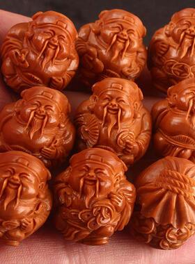 2026八大财神橄榄核手串手工雕刻 爆红老料短圆大籽精品手链配饰