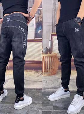 S113秋冬新款春装男士刺绣字母牛仔裤修身小脚长裤潮流时尚休闲裤