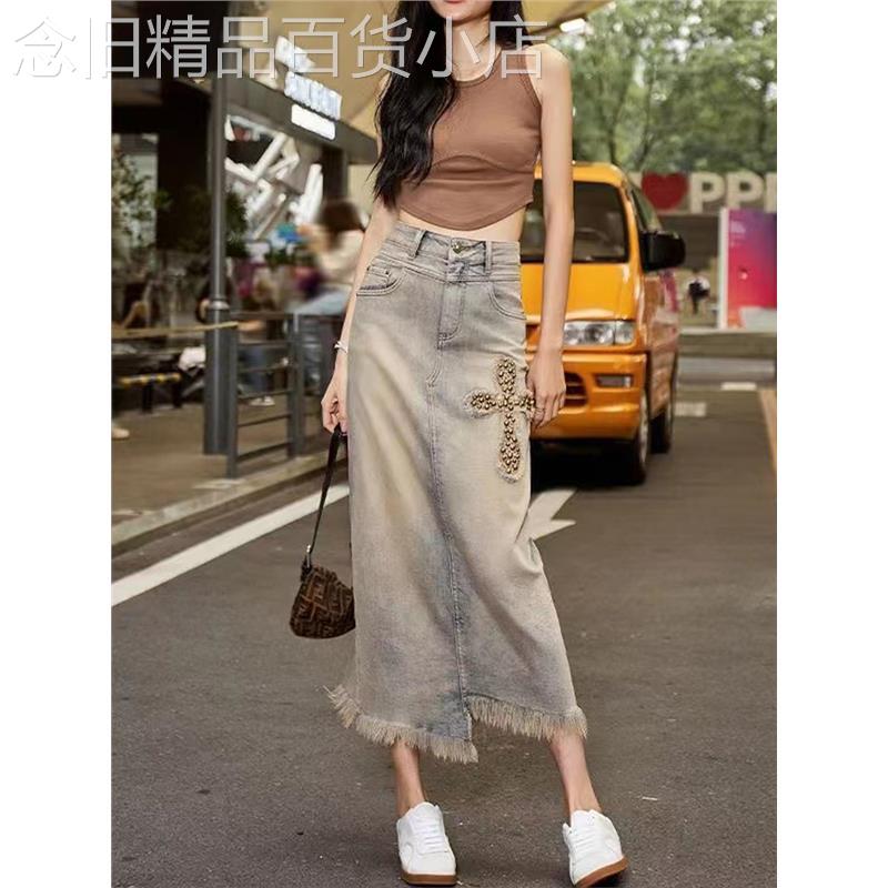 欧洲站高腰牛仔半身裙女2025年春秋新款不规则毛边后开叉一步裙子