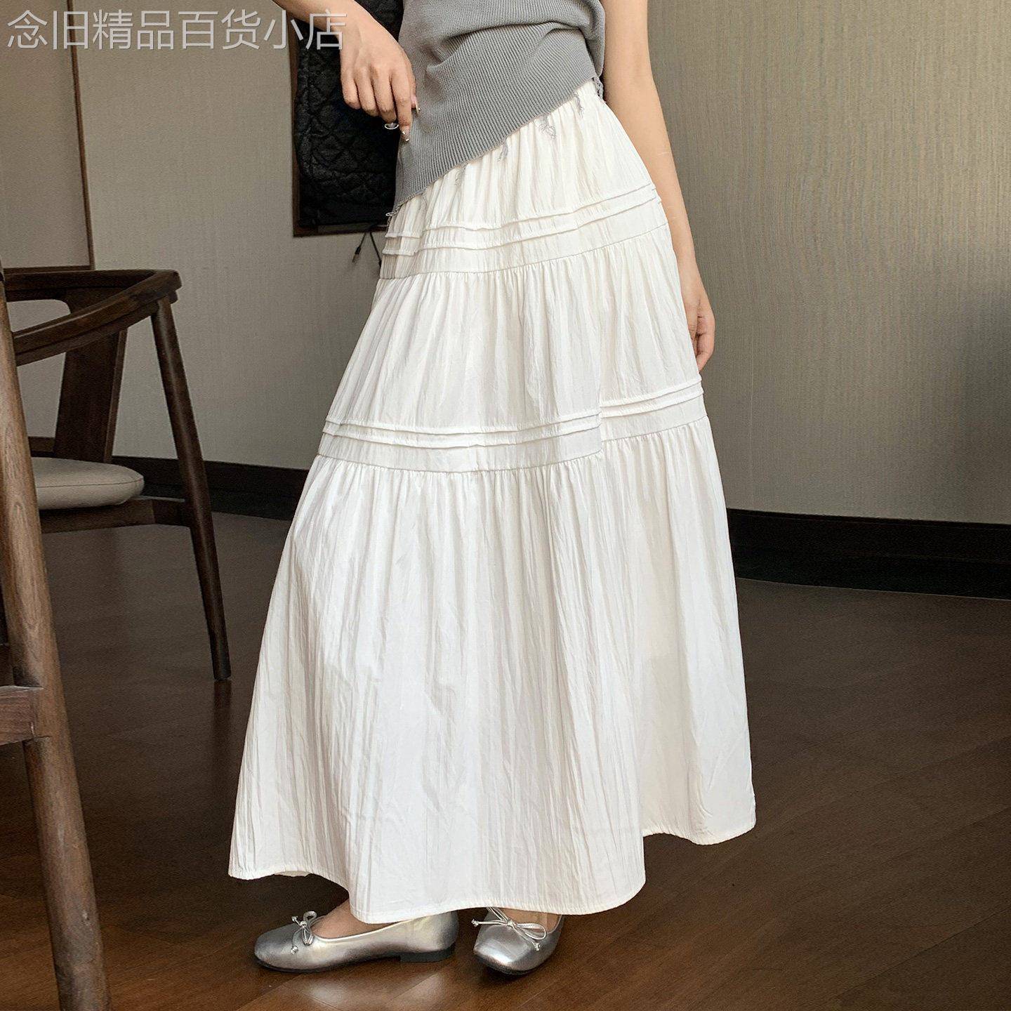 白色a字半身裙女夏2026新款蛋糕伞裙垂感法式高端精致气质长裙子