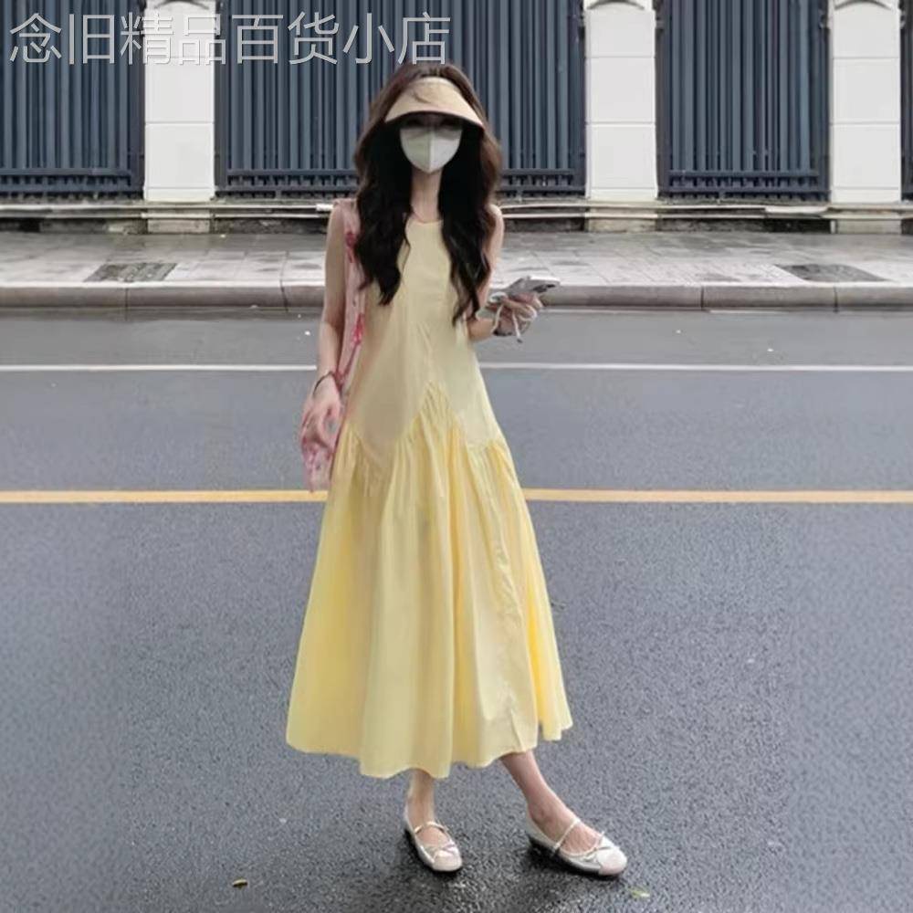 欧洲站夏季女装2026年新款黄色无袖背心连衣裙海边度假法式长裙子