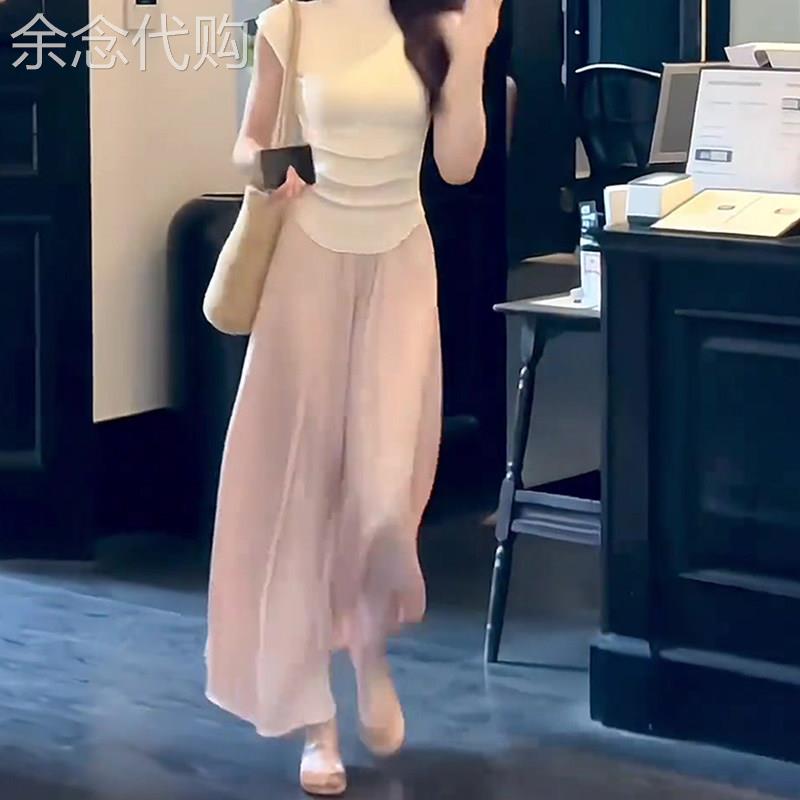 粉色半身裙女2026年夏季新款高腰显瘦松紧腰中长版宽松气质a字裙