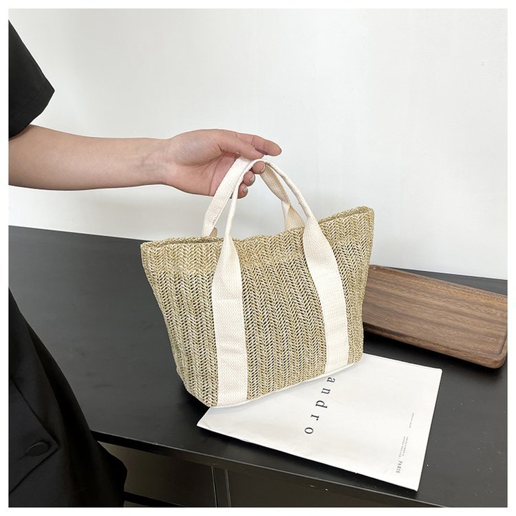 手提草编包大容量夏天包包女小清新旅游度假百搭沙滩包水桶包