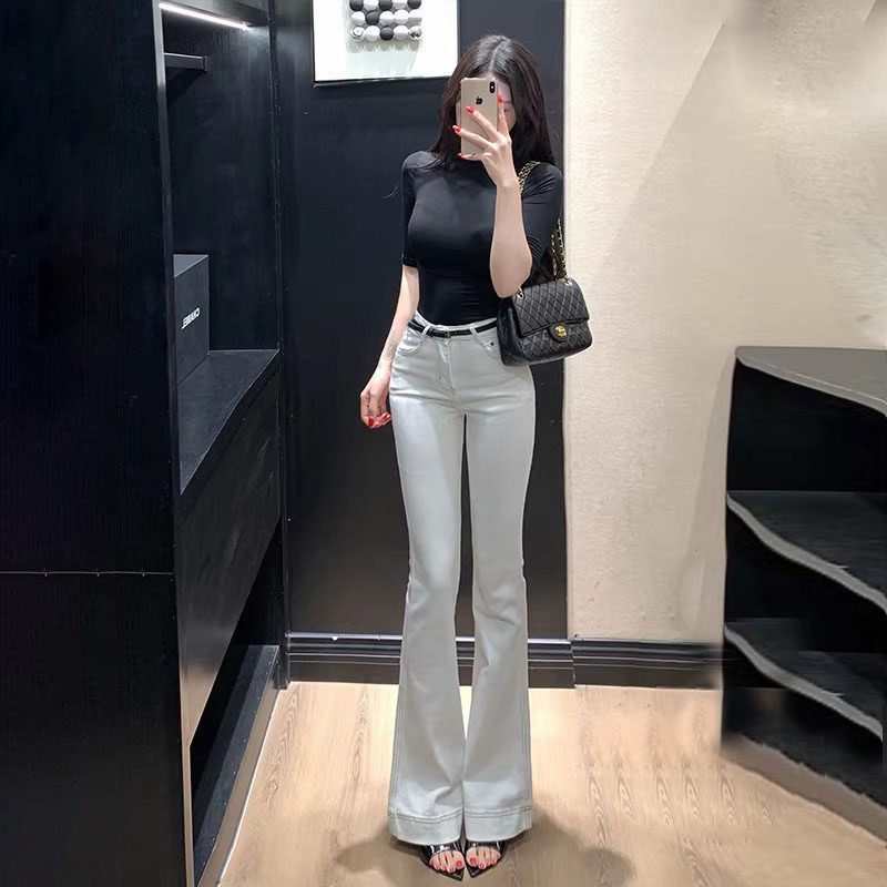 李李服饰后口袋刺绣微喇牛仔裤女202春季新款质感提臀百搭裤