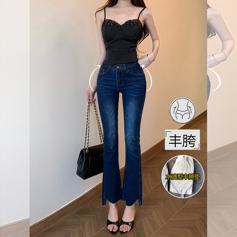 李李服饰丰胯刺绣九分微喇叭裤女2026年夏季不规则剪边裤脚牛仔裤