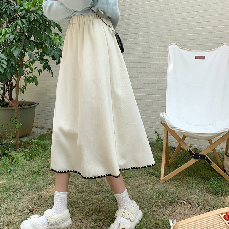 米白色针织半身裙女秋冬大码设计感别致裙子中长款a字高腰伞裙潮