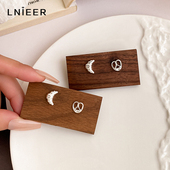 925纯银针碱水牛角包AB耳钉女轻奢小众高级感独特耳环养耳洞耳饰