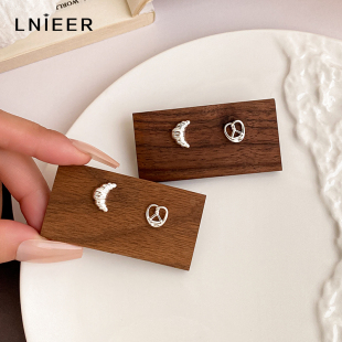 925纯银针碱水牛角包AB耳钉女轻奢小众高级感独特耳环养耳洞耳饰