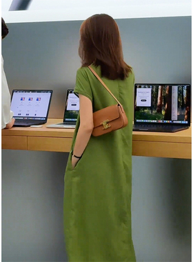 绿色简约连衣裙女镂空短袖设计感2026春季新款气质宽松显瘦长裙