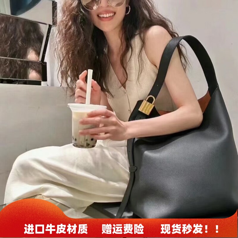 2026秋冬新款真皮托特包大容量锁头水桶包慵懒风单肩斜挎通勤大包