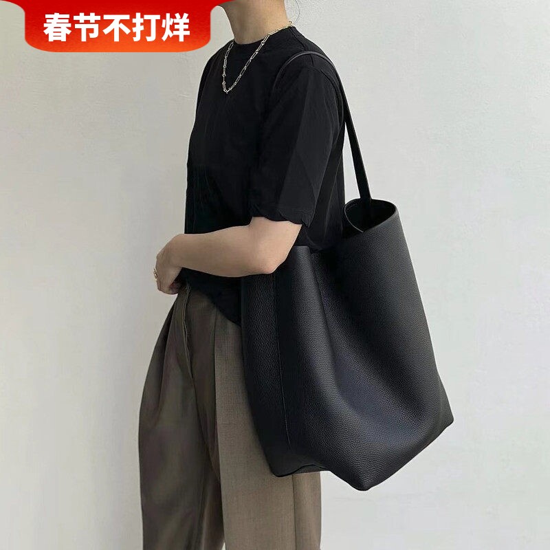 小众牛皮通勤托特包女真皮大容量水桶包2025新款高级感单肩手提包
