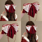红色樱桃蝴蝶结飘带抓夹女2026新款 高级感后脑勺盘发鲨鱼夹子头饰