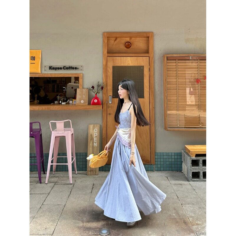 法式蓝色吊带连衣裙子女夏季2026新款显瘦海边度假气质长裙