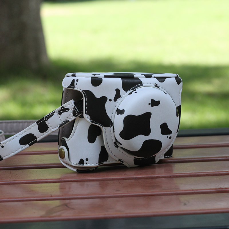 佳能可爱卡通女生单肩斜挎摄影包