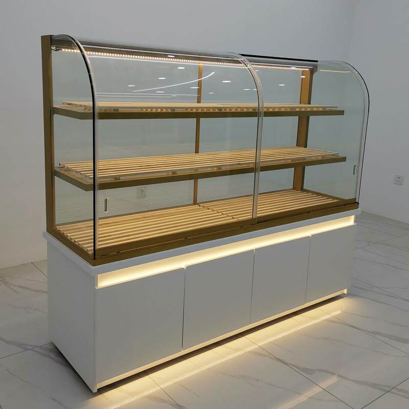 现货边柜面包柜新款高端镀钛不锈钢圆弧形中岛蛋糕模型柜玻璃展示