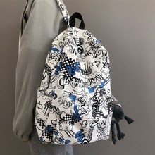 书包美式高街2025男涂鸦帅气百搭高颜值三到六年级初中生潮流背包
