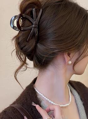 欧茉原创巧克力色蝴蝶结2025新款气质高级感鲨鱼夹子发夹A8059女