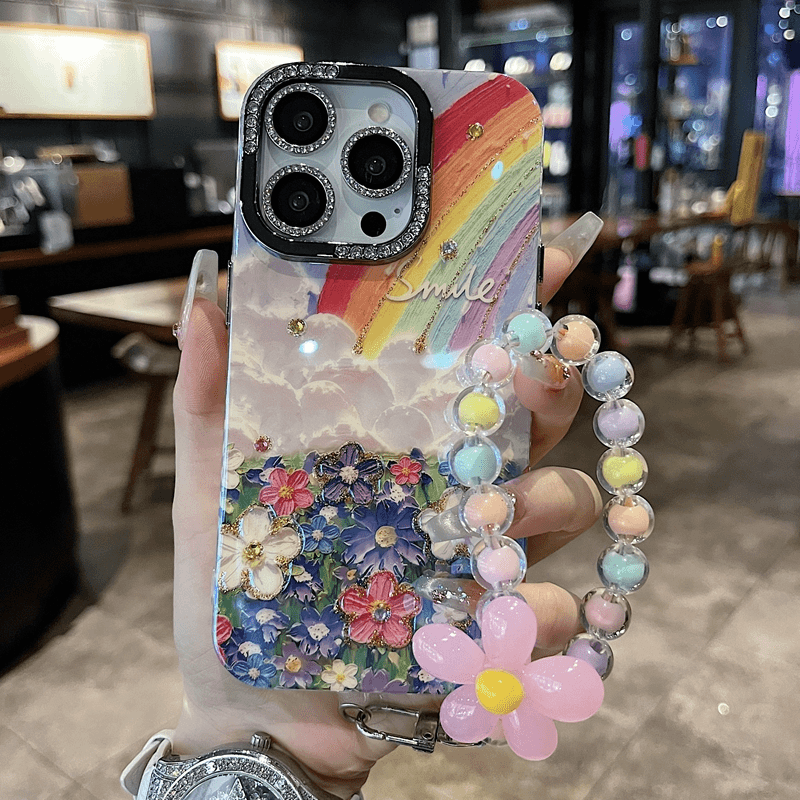 适用苹果系列iPhone15新款手机壳14promax/15pro个性创意ins风彩虹花海手链加闪钻镜头膜防摔14/13网红保护套