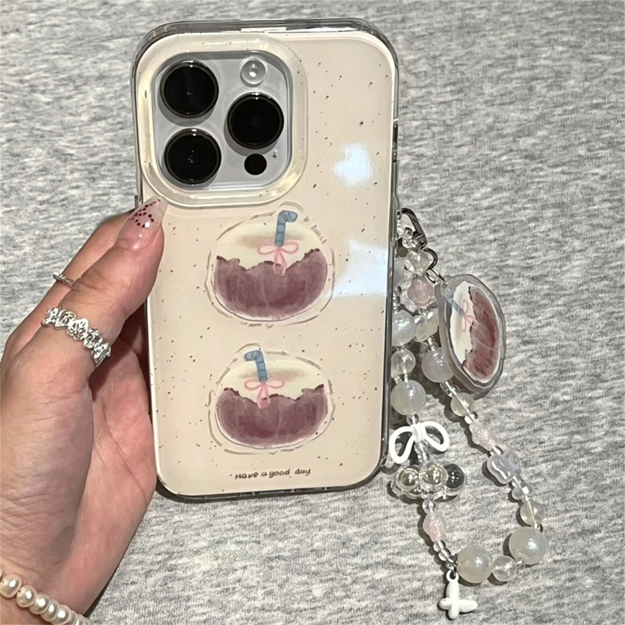 适用苹果系列iPhone17新款手机壳16promax14promax奶茶棕两颗椰子15promax/13pro半包大孔防摔网红女款保护套