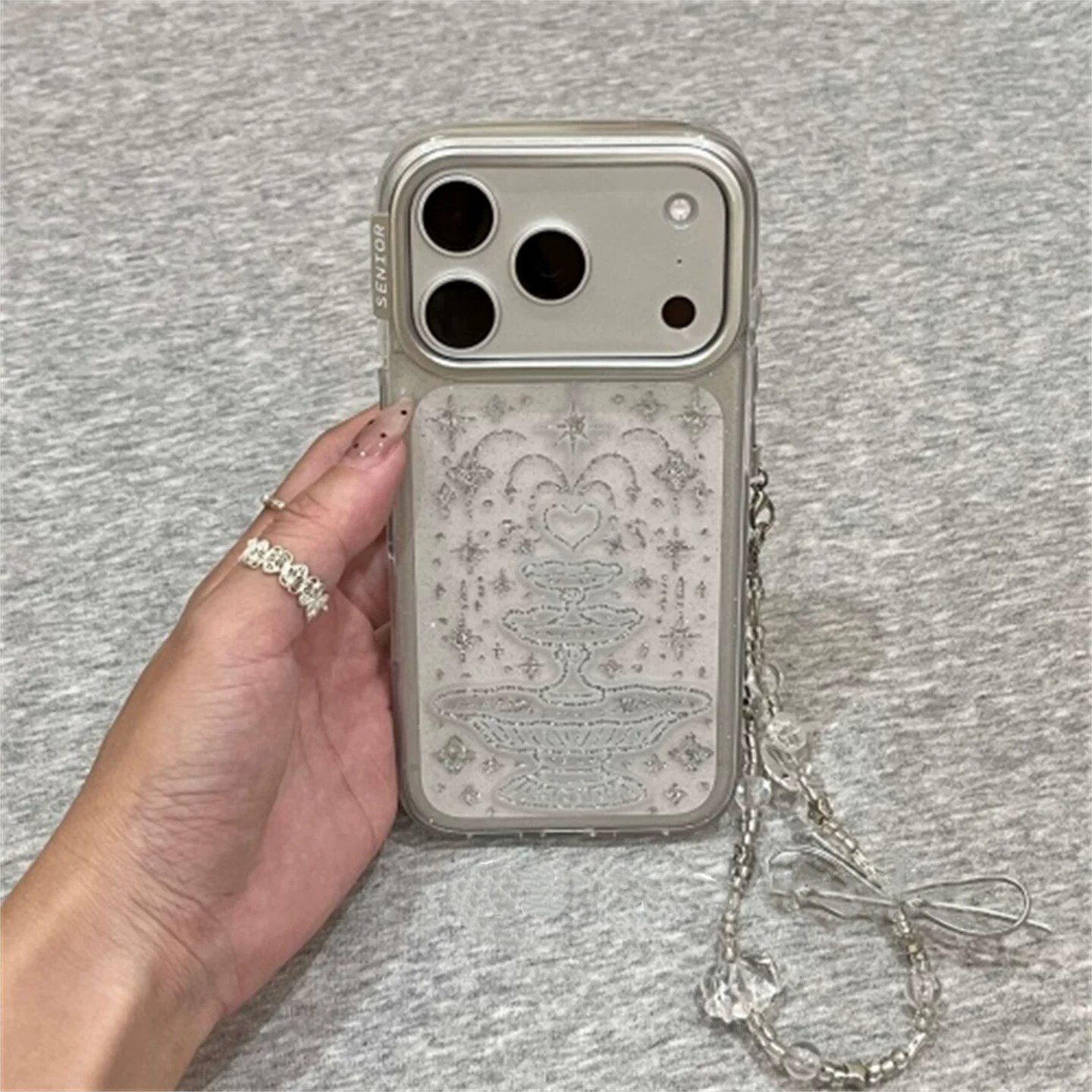 适用苹果系列iPhone17新款手机壳16promax14promax透明细闪爱心喷泉15promax13pro半包大孔防摔网红ins保护套