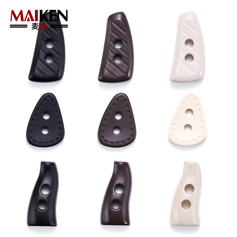 麦肯牛角扣大衣纽扣新款对扣配件