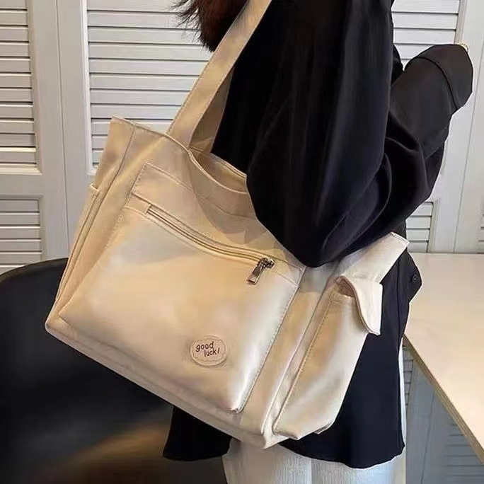 帆布托特包硬底包包女款大容量装电脑通勤包凡布的单肩包手提布袋